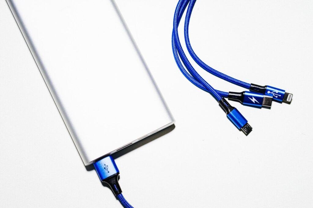 white and blue coated power bank