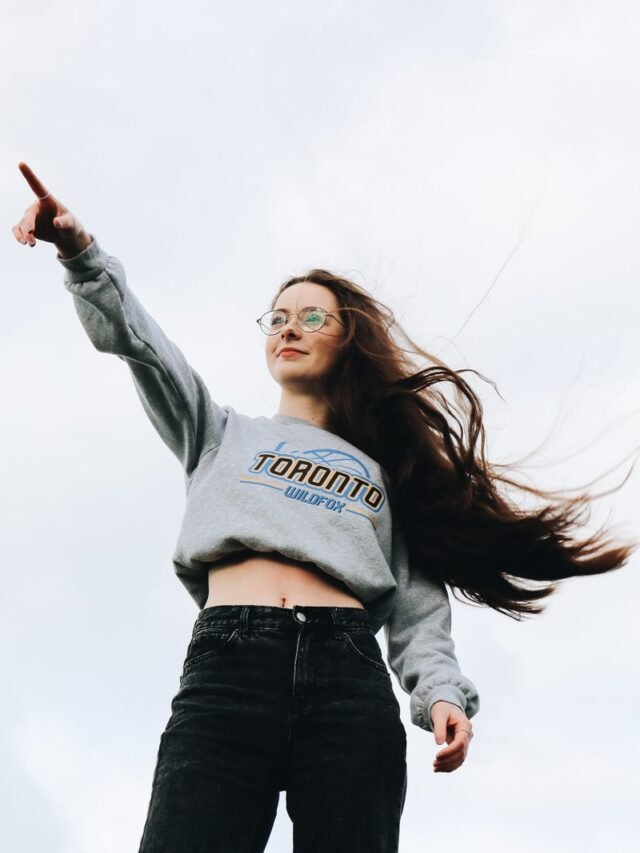 woman pointing using her right hand