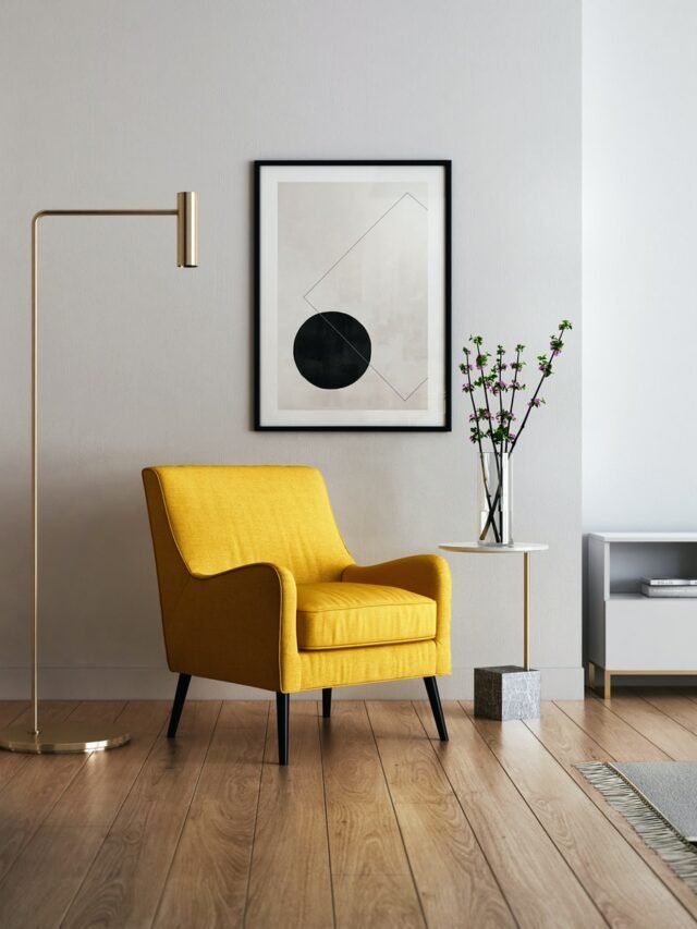 brown wooden framed yellow padded chair